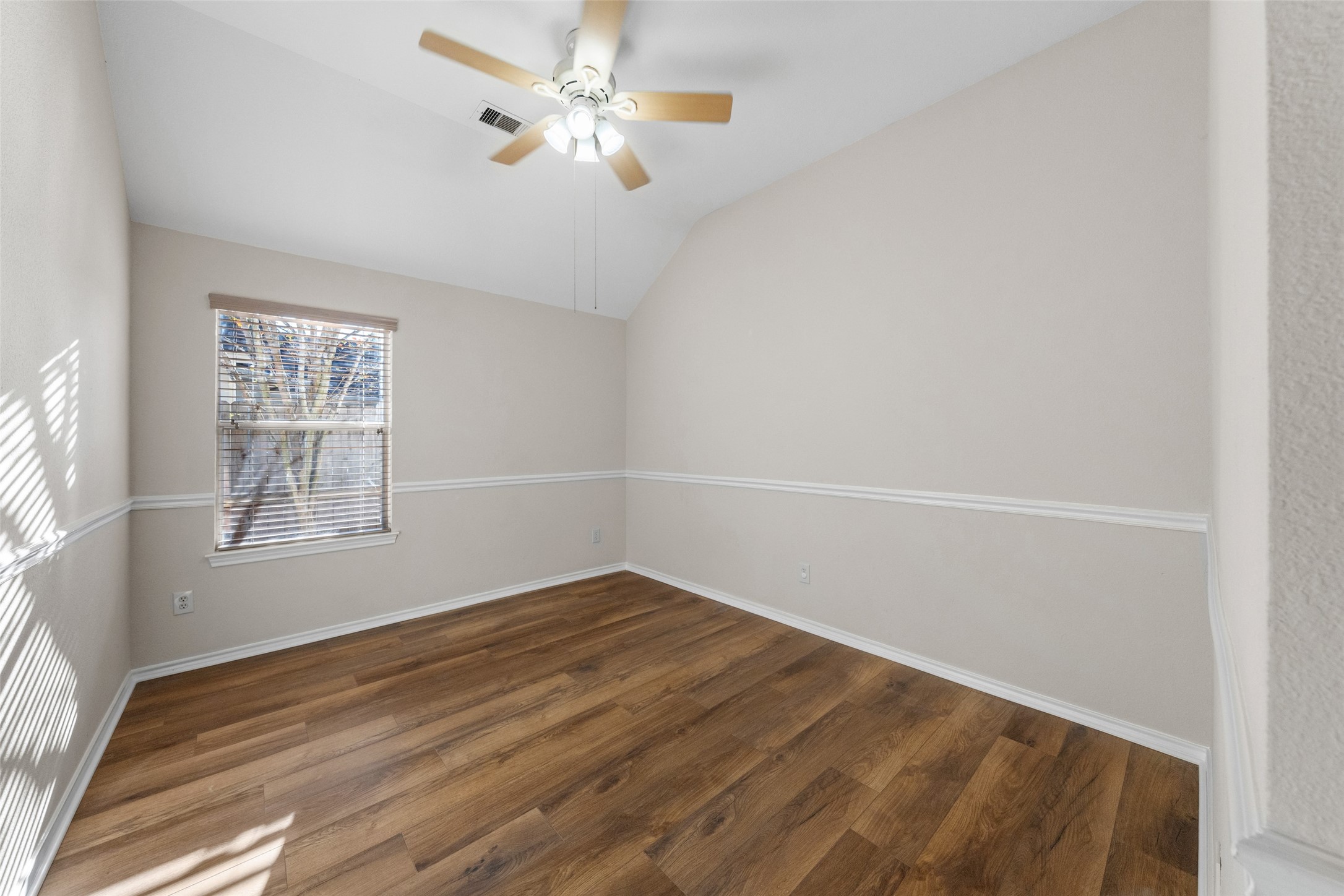 2443 Morgan Ridge Lane Spring, TX 77386 - Photo 21 of 26 wooden floor in an empty room with a window