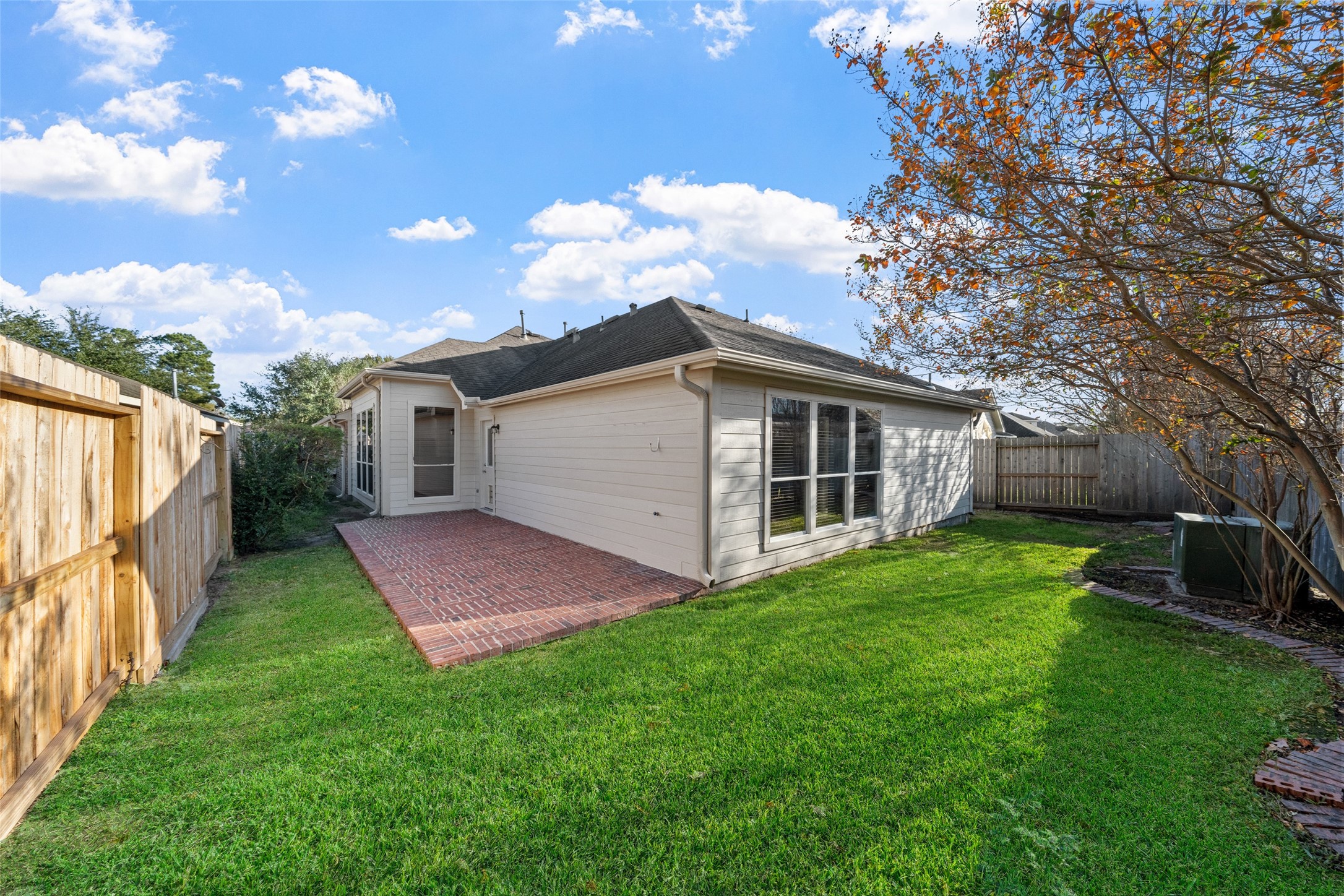 2443 Morgan Ridge Lane Spring, TX 77386 - Photo 25 of 26 a view of a house with backyard and garden