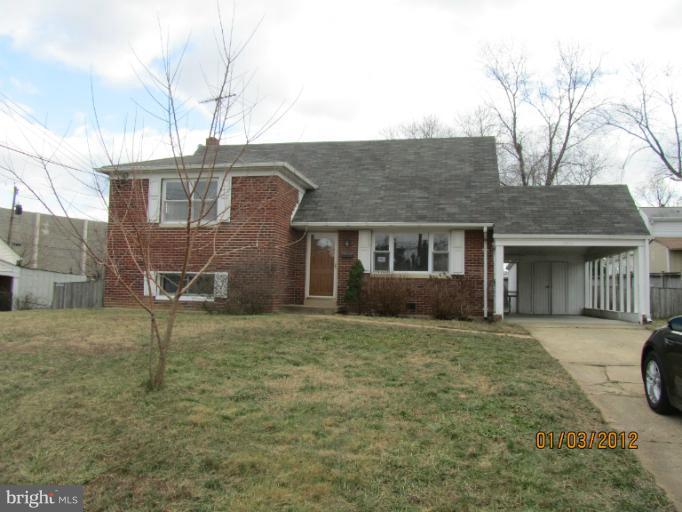 5803 Channing Road Springfield, VA 22150 - Photo 12 of 12 a front view of a house with a garden
