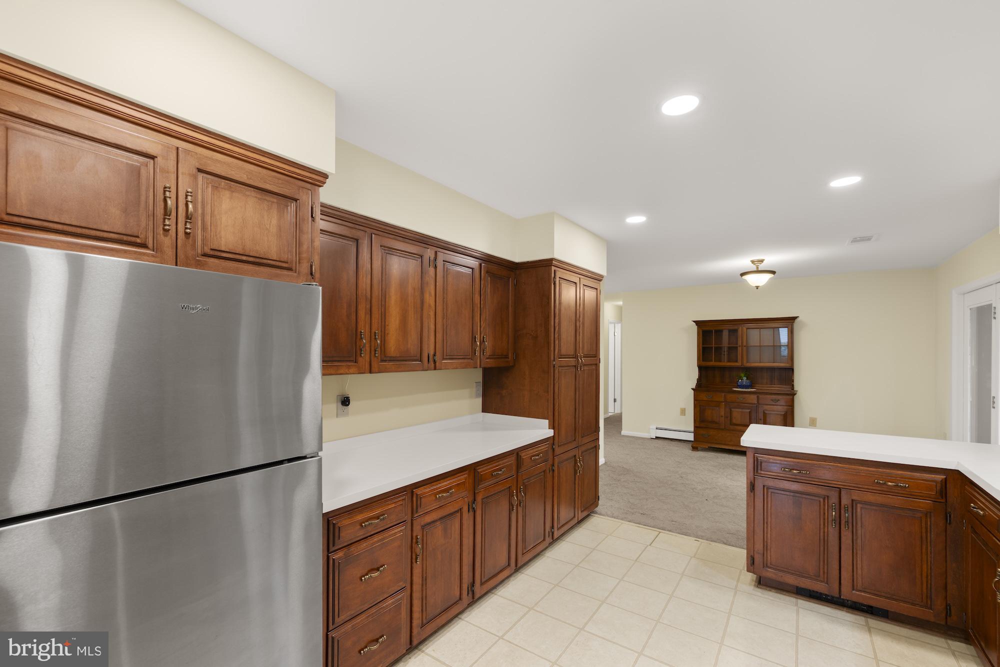 617 Heritage Drive Gettysburg, PA 17325 - Photo 16 of 56 a kitchen with stainless steel appliances granite countertop a refrigerator sink and cabinets