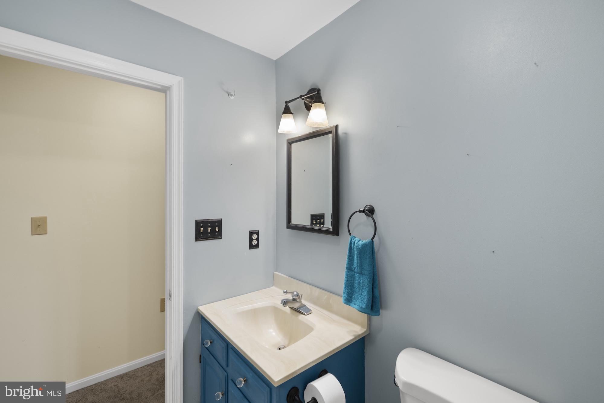 617 Heritage Drive Gettysburg, PA 17325 - Photo 20 of 56 a bathroom with a toilet sink and mirror