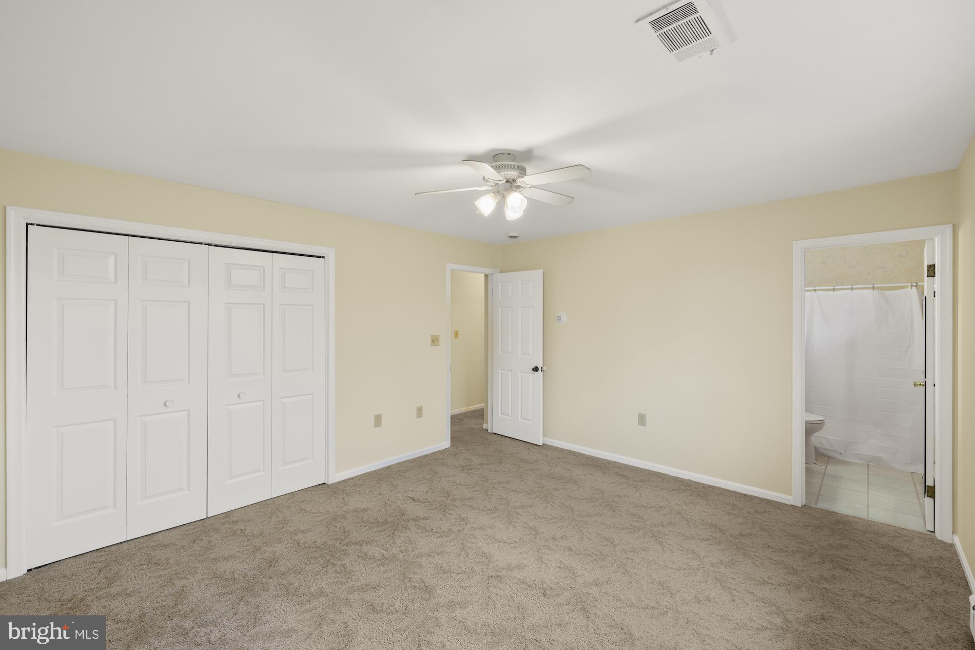 617 Heritage Drive Gettysburg, PA 17325 - Photo 22 of 56 an empty room with a ceiling fan and a window