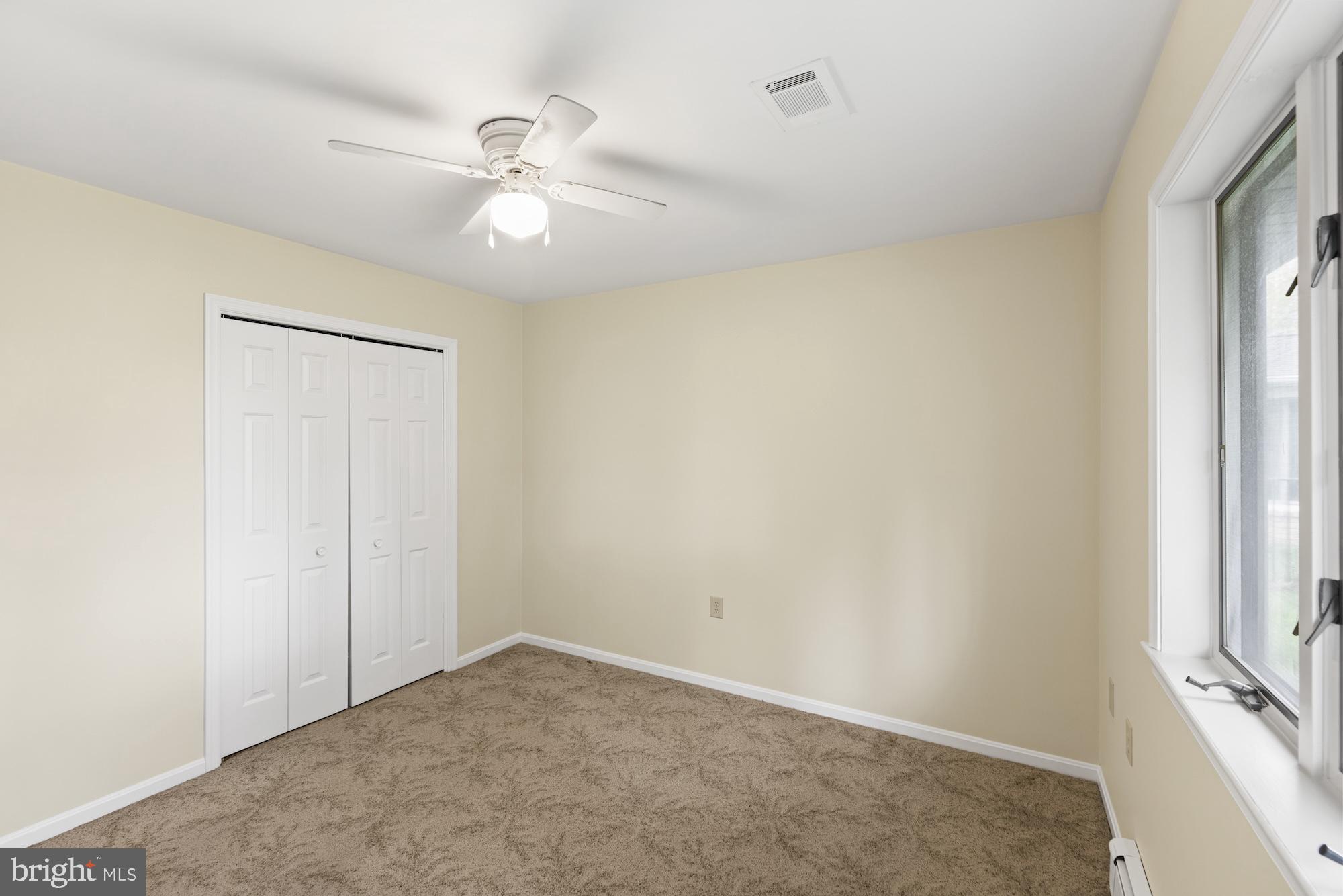 617 Heritage Drive Gettysburg, PA 17325 - Photo 30 of 56 an empty room with a window and a fan