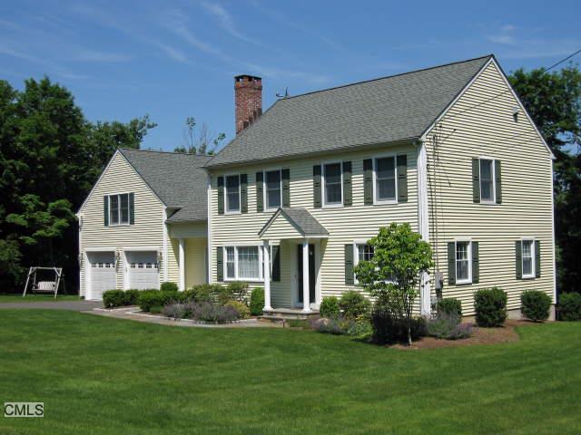38 Highview Drive Ridgefield, CT 06877 - Photo 1 of 1 a front view of a house with a yard
