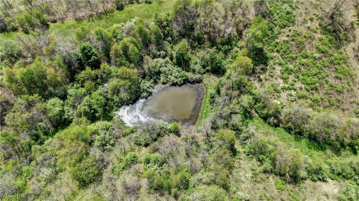 7166 Clay Pike Road Cambridge, OH 43725 - Photo 10 of 27 Drone / aerial view with a water view