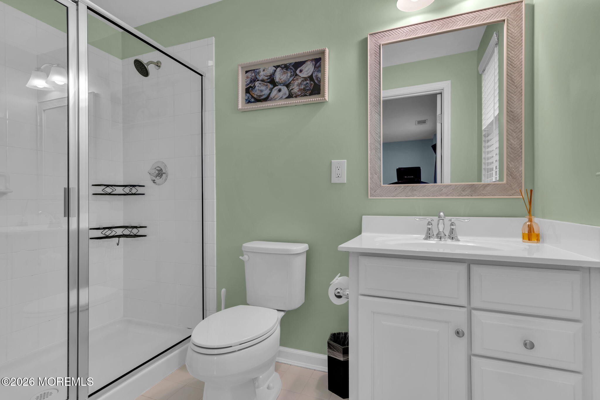 101 Spirit Way, Unit 301 Brick, NJ 08723 - Photo 12 of 52 a bathroom with a toilet sink and shower