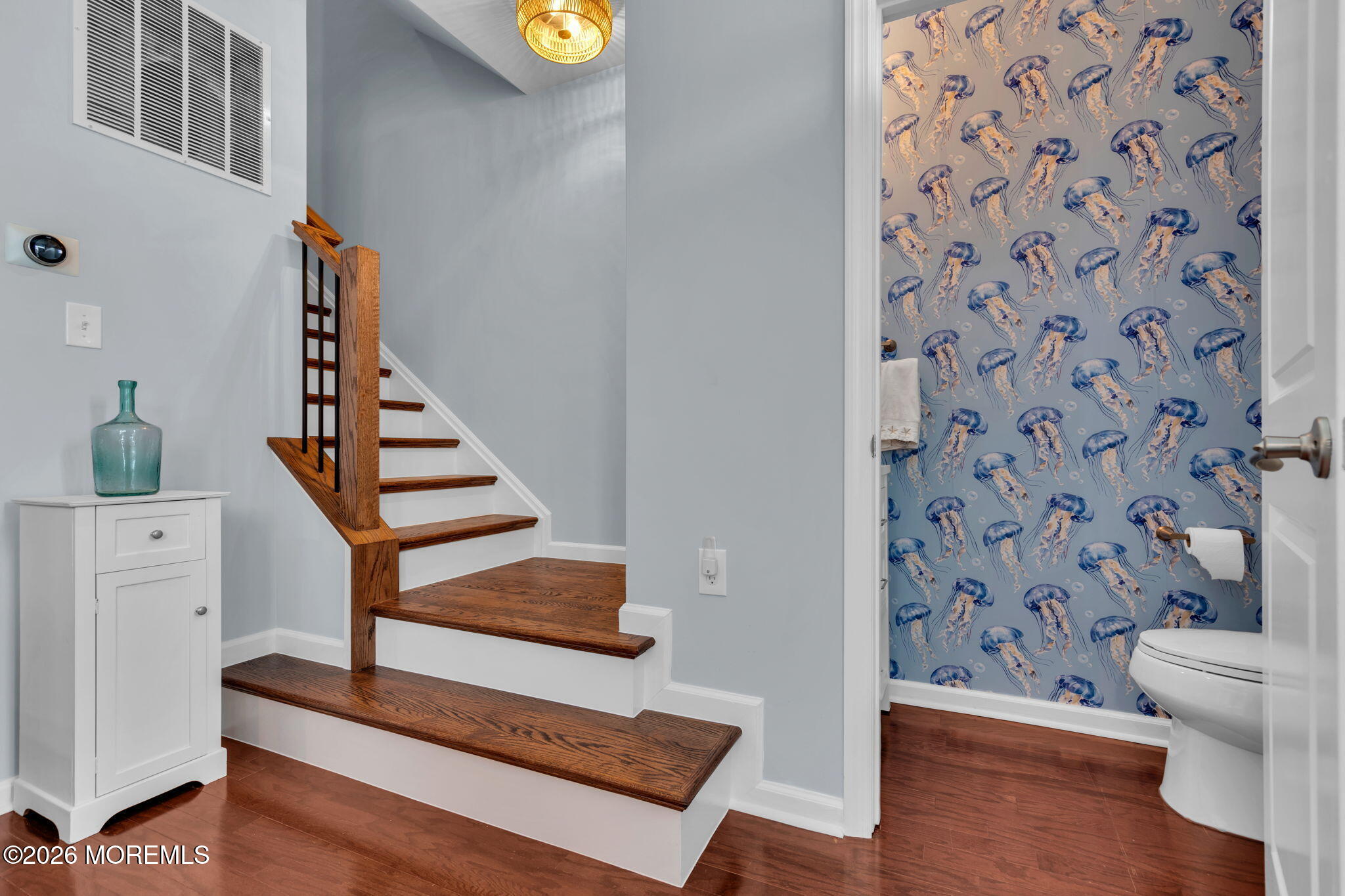 101 Spirit Way, Unit 301 Brick, NJ 08723 - Photo 26 of 52 a view of a hallway with wooden floor and entryway