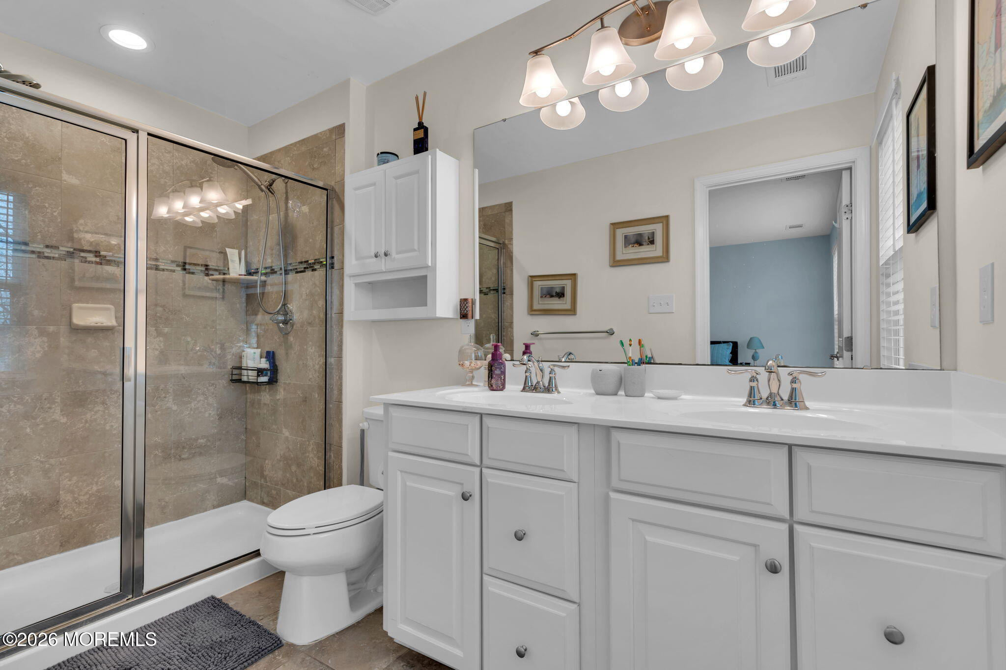 101 Spirit Way, Unit 301 Brick, NJ 08723 - Photo 31 of 52 a bathroom with a sink a toilet and shower