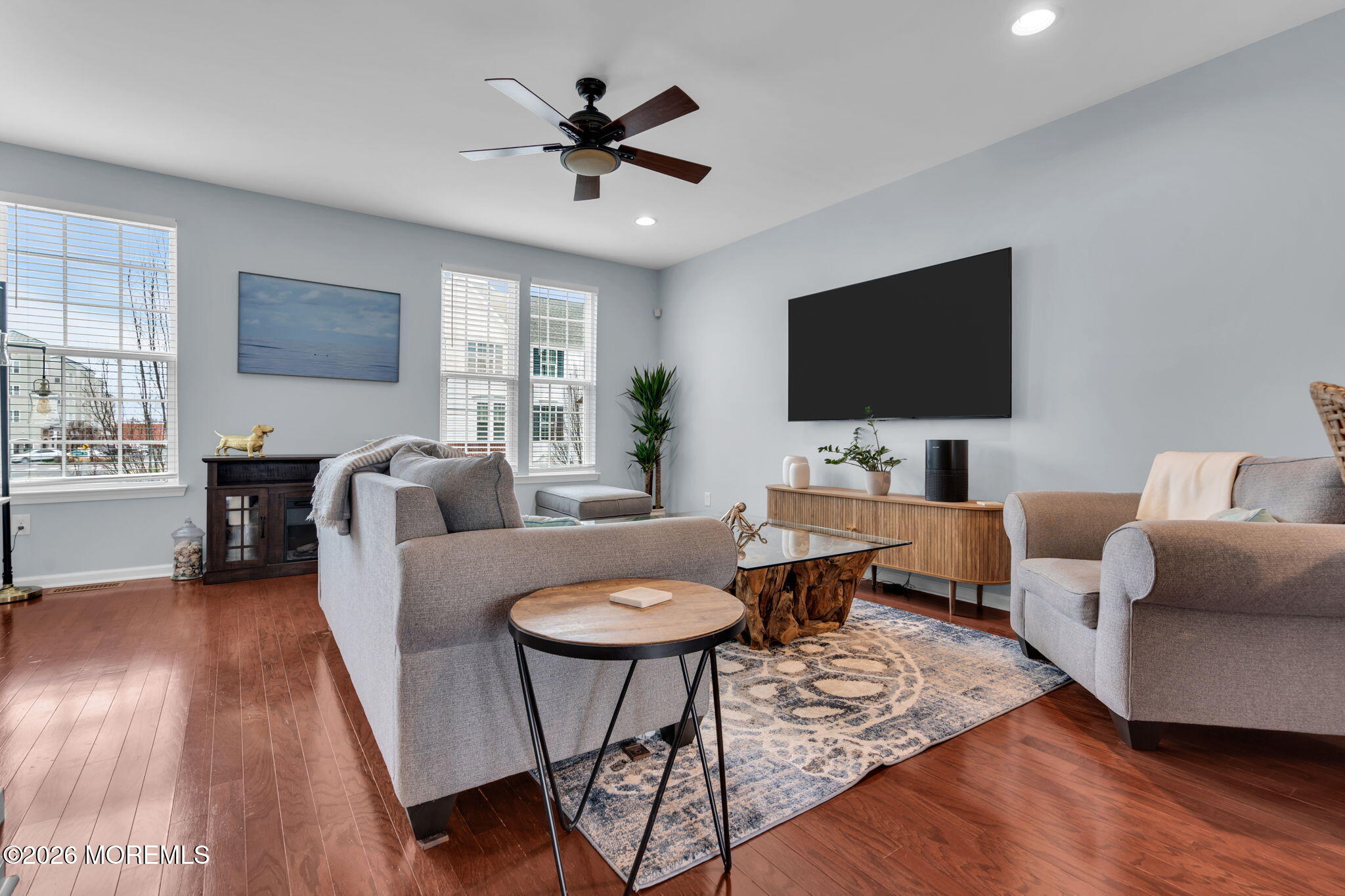 101 Spirit Way, Unit 301 Brick, NJ 08723 - Photo 32 of 52 a living room with furniture and a flat screen tv