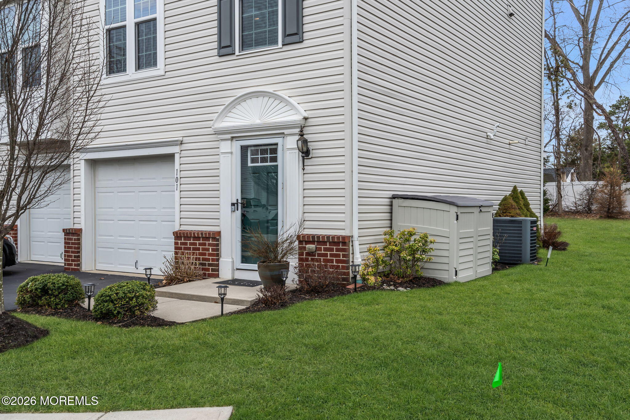 101 Spirit Way, Unit 301 Brick, NJ 08723 - Photo 36 of 52 a front view of house with yard and green space