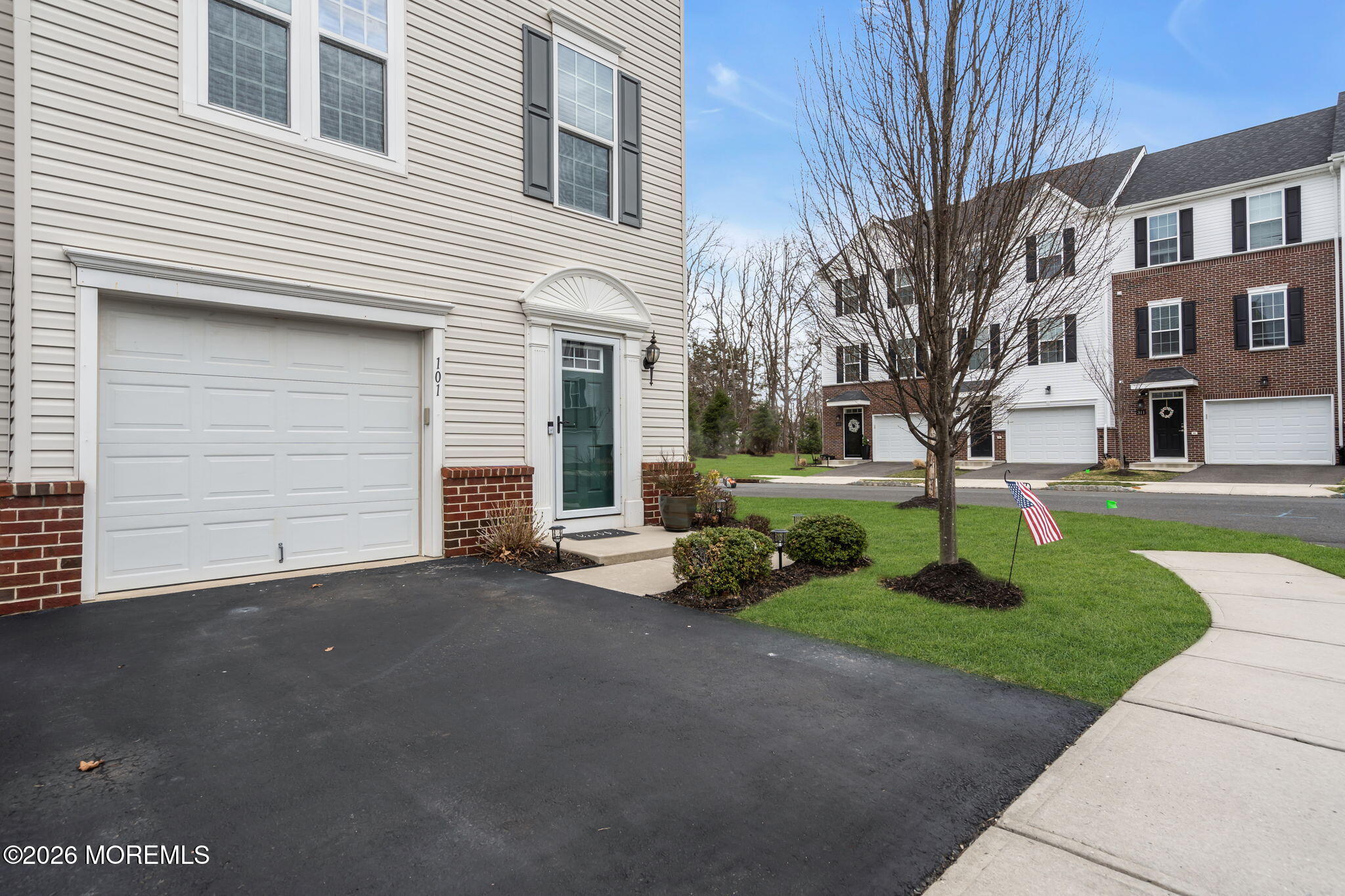 101 Spirit Way, Unit 301 Brick, NJ 08723 - Photo 39 of 52 a view of a house with a yard