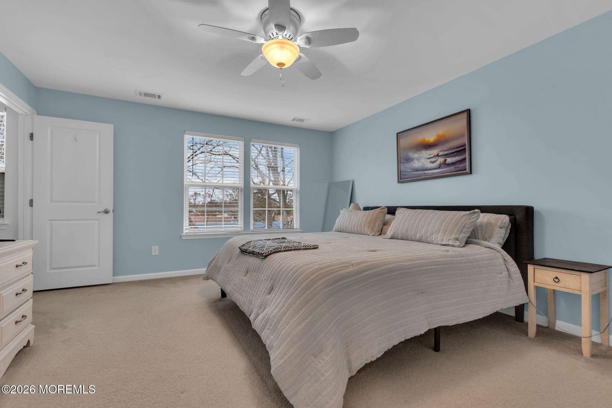 101 Spirit Way, Unit 301 Brick, NJ 08723 - Photo 4 of 52 a bedroom with a bed and a window