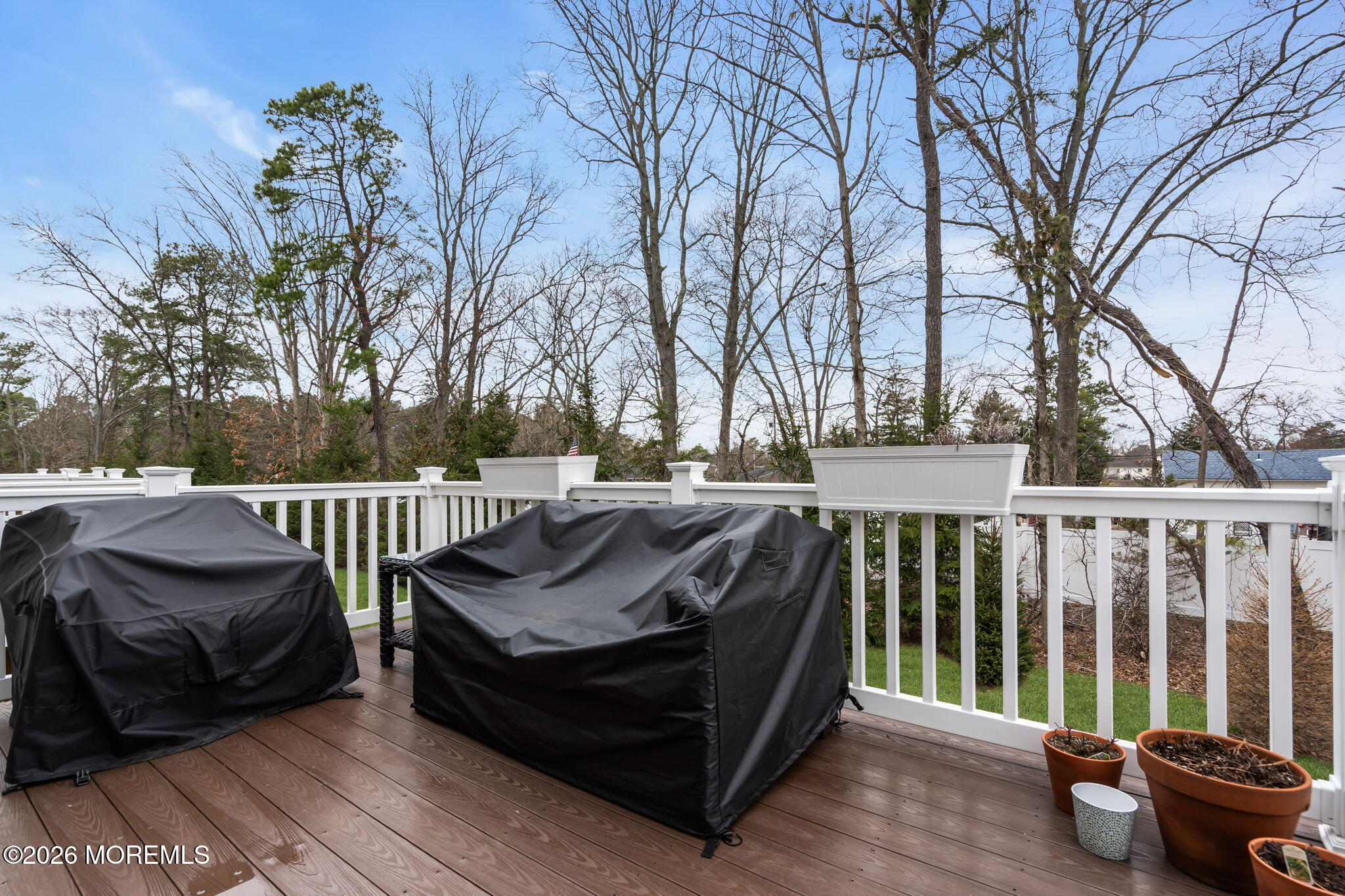 101 Spirit Way, Unit 301 Brick, NJ 08723 - Photo 41 of 52 a view of a two chairs in the deck