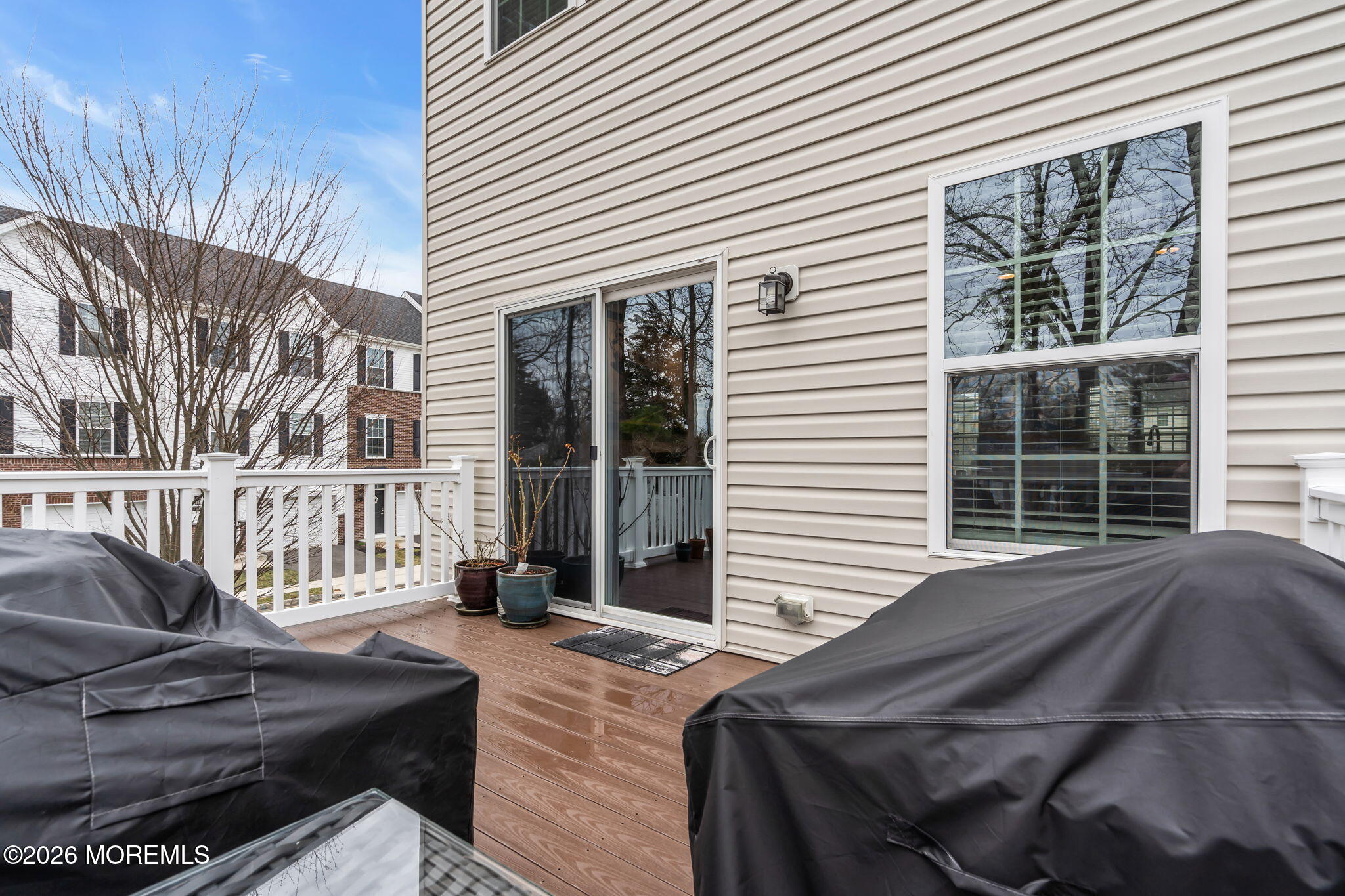 101 Spirit Way, Unit 301 Brick, NJ 08723 - Photo 42 of 52 a view of a house with a bed and wooden floor