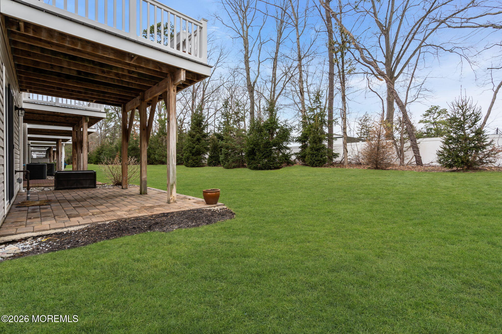 101 Spirit Way, Unit 301 Brick, NJ 08723 - Photo 44 of 52 a view of a porch with a backyard