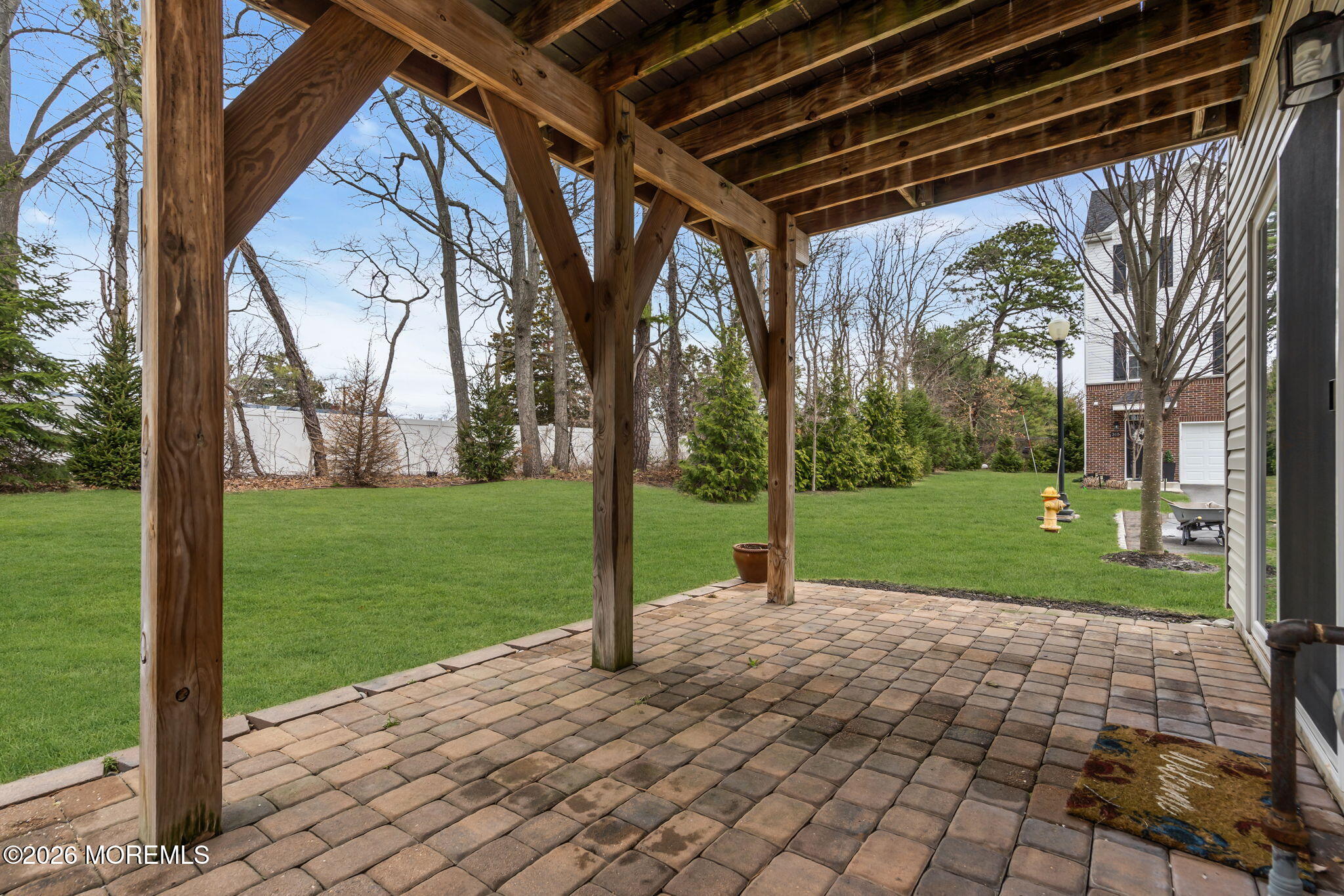 101 Spirit Way, Unit 301 Brick, NJ 08723 - Photo 45 of 52 a view of a backyard with garden