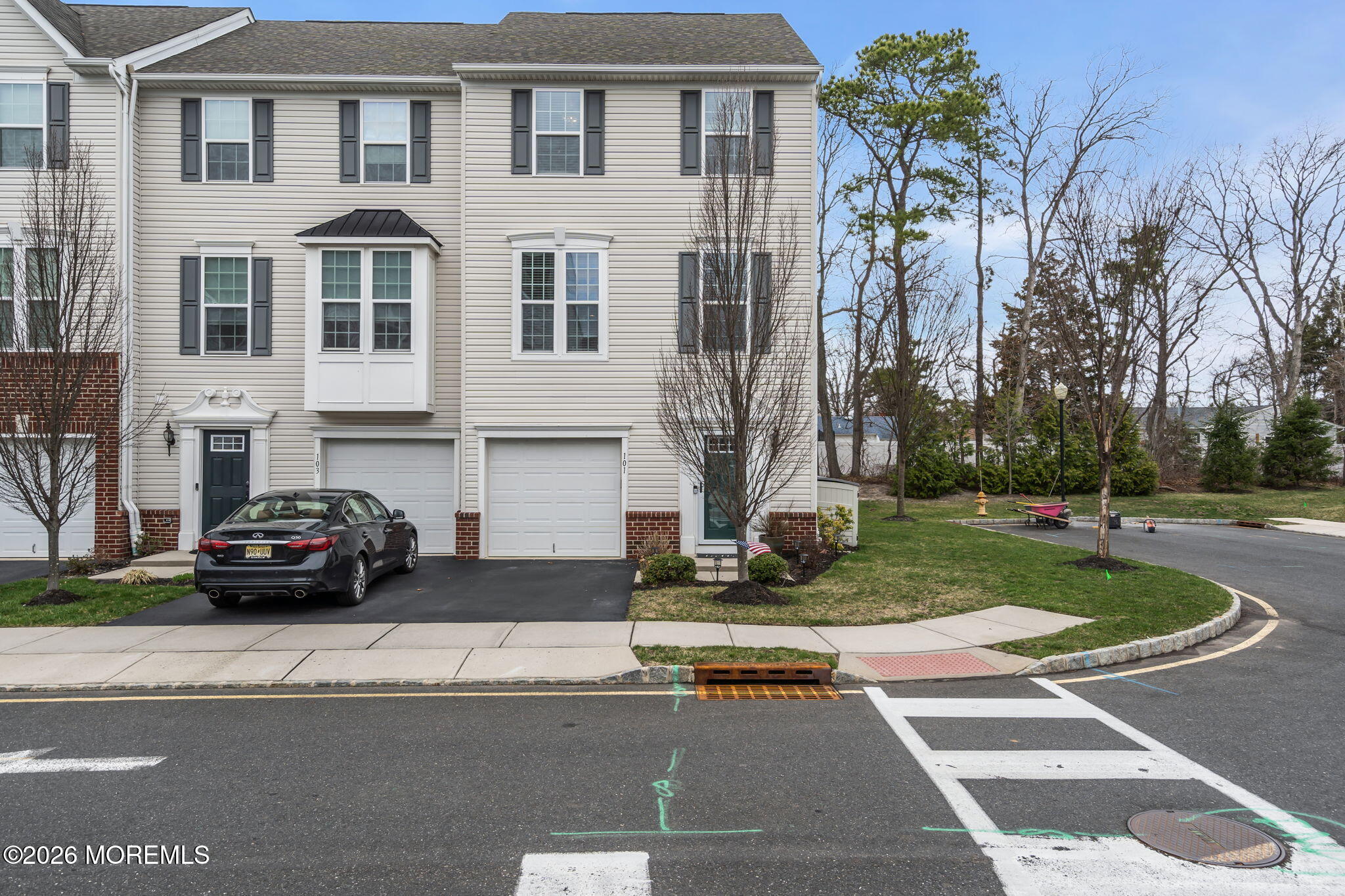 101 Spirit Way, Unit 301 Brick, NJ 08723 - Photo 48 of 52 a black and white car parked in front of a building