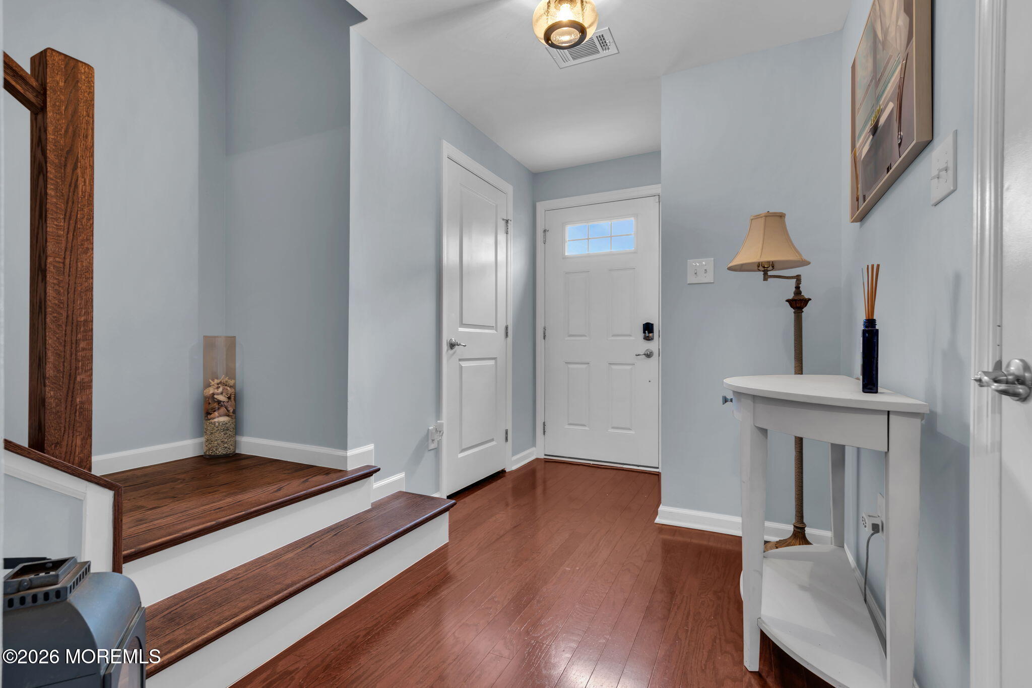 101 Spirit Way, Unit 301 Brick, NJ 08723 - Photo 6 of 52 a view of livingroom with hardwood floor and hallway