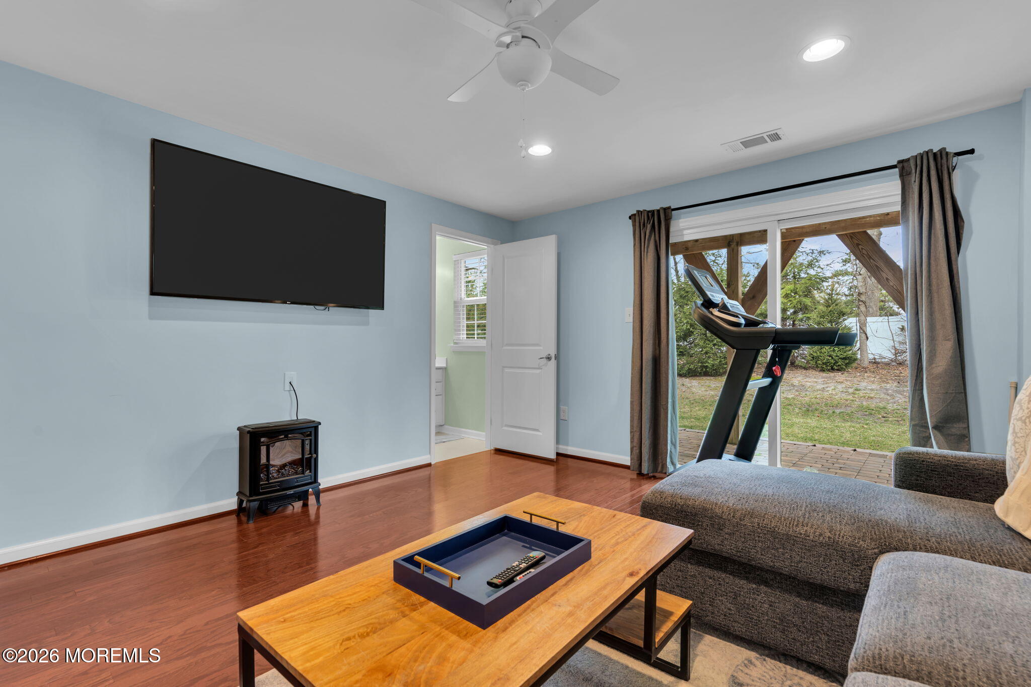 101 Spirit Way, Unit 301 Brick, NJ 08723 - Photo 8 of 52 a living room with furniture and a flat screen tv