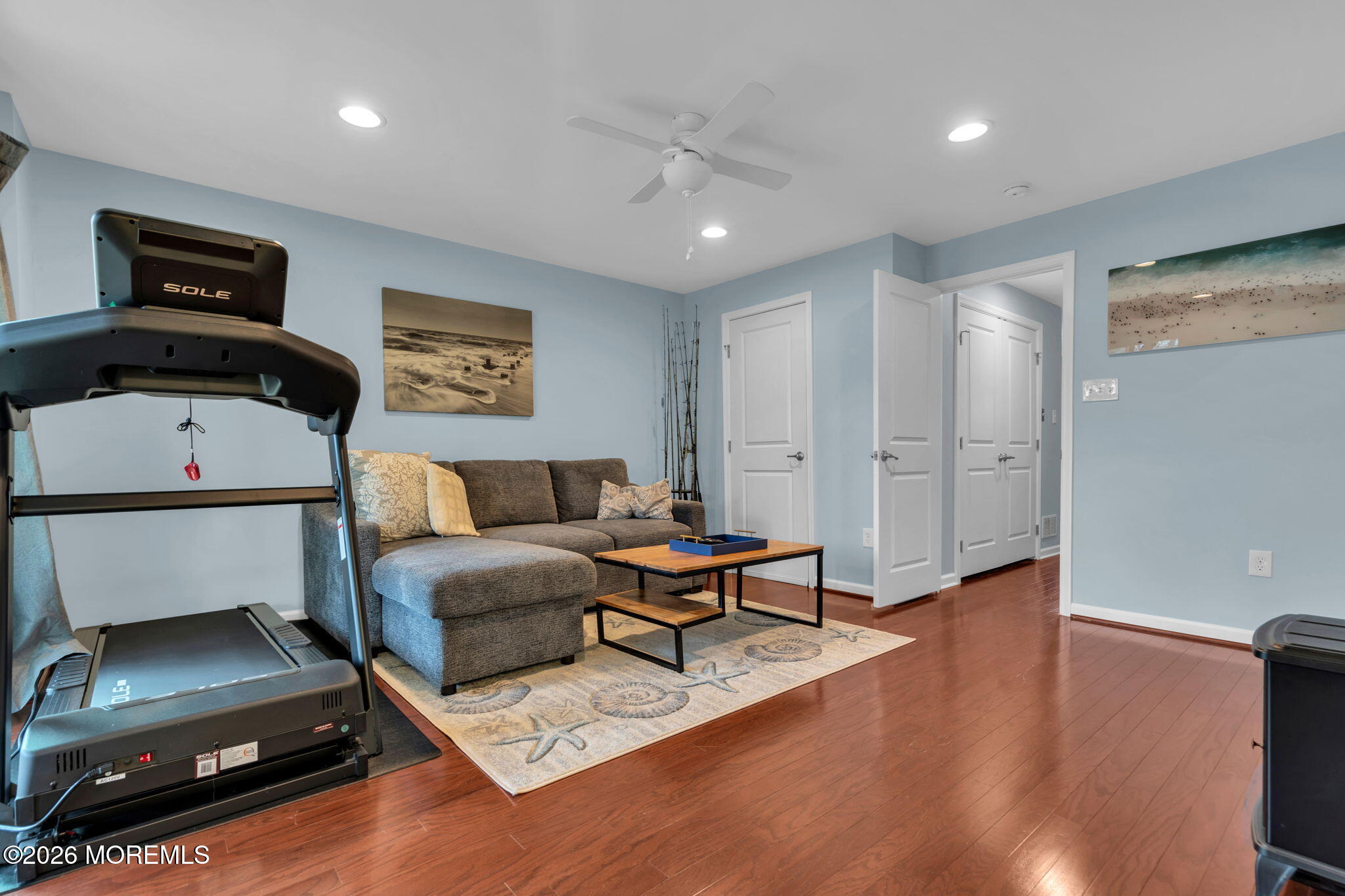 101 Spirit Way, Unit 301 Brick, NJ 08723 - Photo 9 of 52 a living room with furniture and a wooden floor