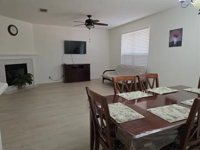 a view of a dining room with furniture