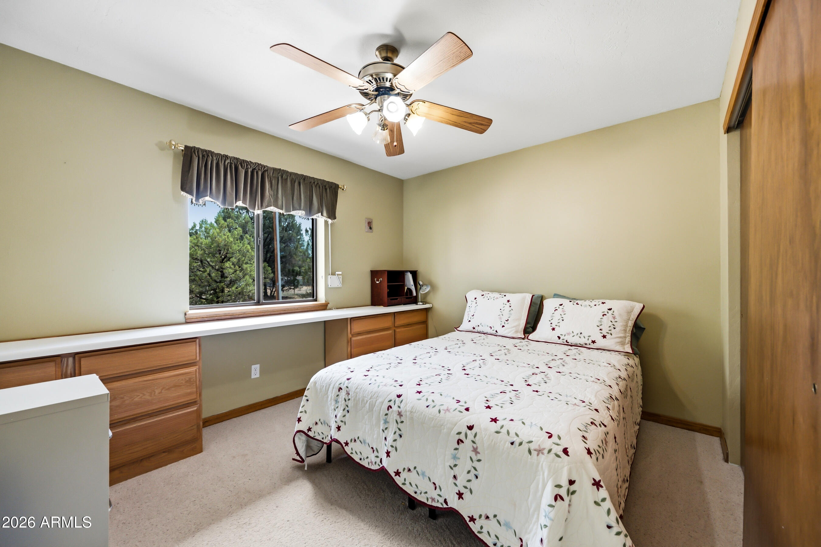 3071 Ponderosa Road Overgaard, AZ 85933 - Photo 44 of 72 Secondary bedroom with built in storage