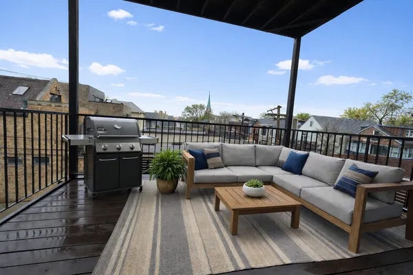 a view of a terrace with couches
