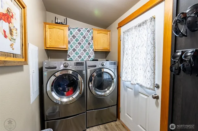a utility room with dryer and washer