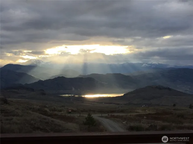 a view of sunset and mountains