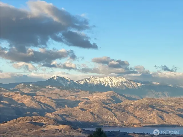 a view of a yard covered with snow