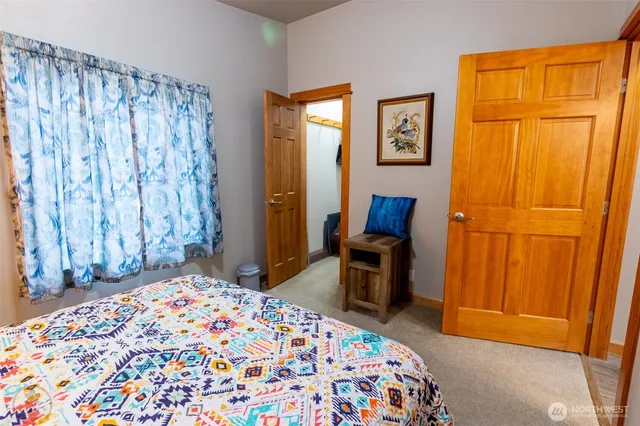 a bedroom with a bed and furniture