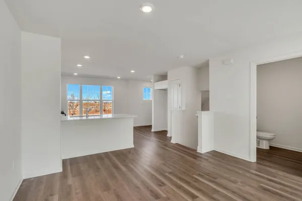 a view of kitchen with stainless steel appliances refrigerator and microwave