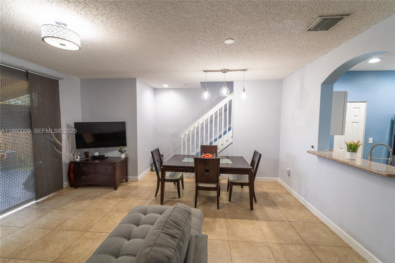 983 Northeast 42nd Place Homestead, FL 33033 - Photo 29 of 51 a dining room with furniture and entryway