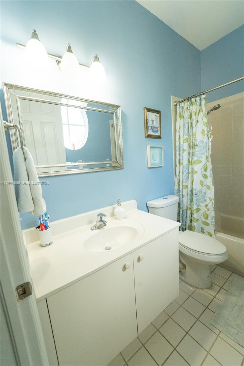 983 Northeast 42nd Place Homestead, FL 33033 - Photo 41 of 51 a utility room with a sink a washer and dryer