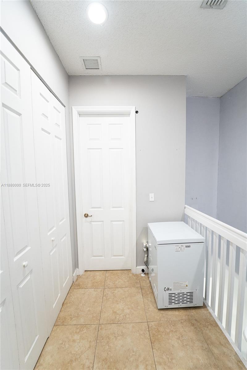 983 Northeast 42nd Place Homestead, FL 33033 - Photo 42 of 51 a bathroom with a sink a toilet and shower