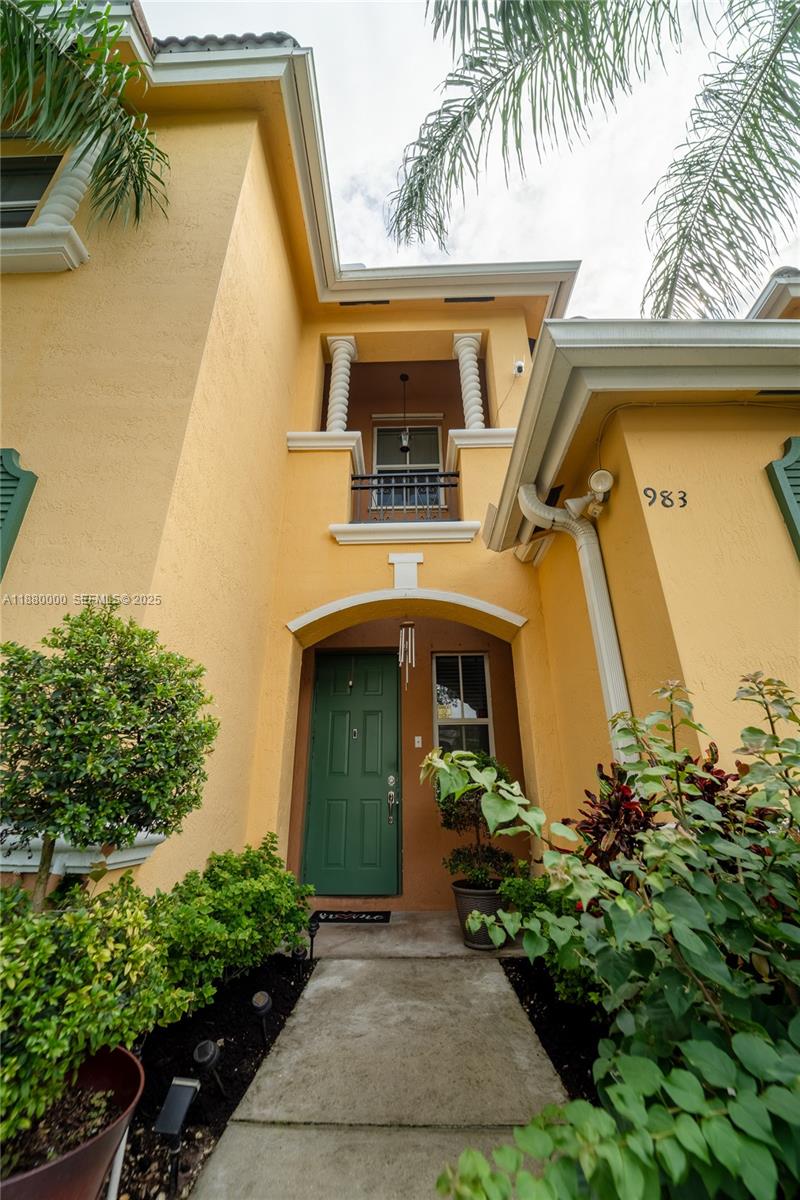 983 Northeast 42nd Place Homestead, FL 33033 - Photo 6 of 51 a front view of a house with garden