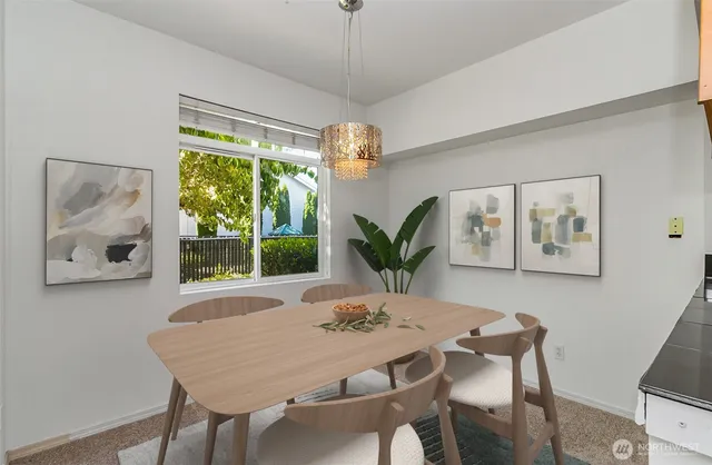 a view of a dining room with furniture window and outside view