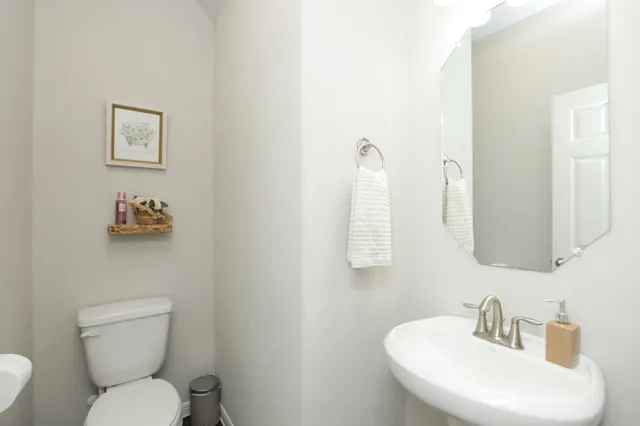 a kitchen with appliances a sink and a window