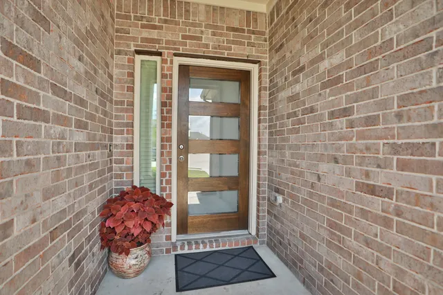 a front view of a house with glass door