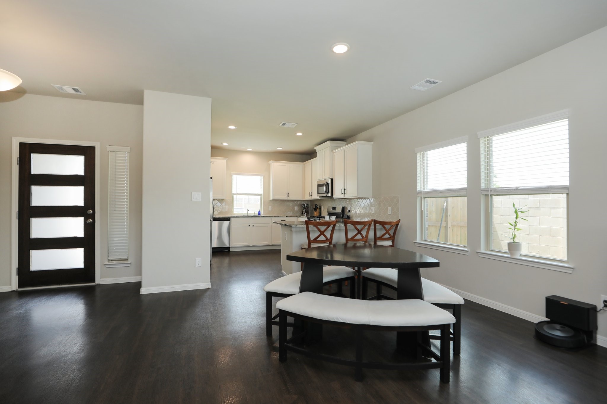 2401 Sequoia Grove Drive Rosharon, TX 77583 - Photo 7 of 39 DINING/ KITCHEN- the easy flow offers cohesive flooring, light filled areas and family fun.