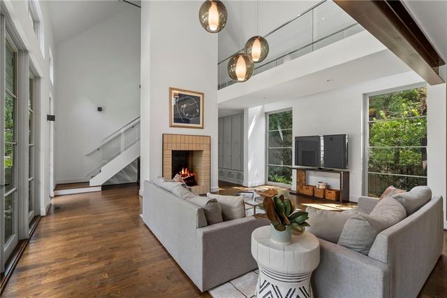 a bathroom with a sink double vanity granite and a mirror