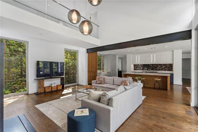 a view of storage and utility room with closet