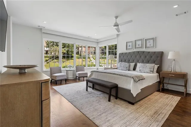 a storage room with wooden floor washer and dryer