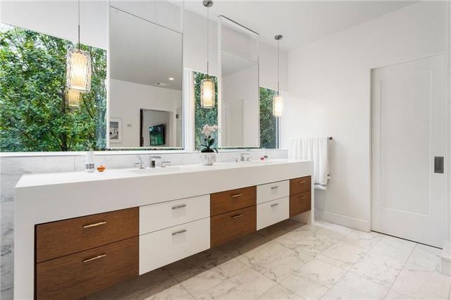 a view of entryway with stairs and wooden floor