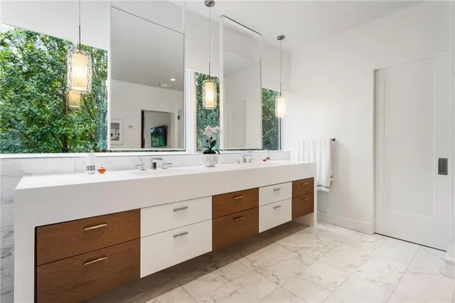 a view of entryway with stairs and wooden floor