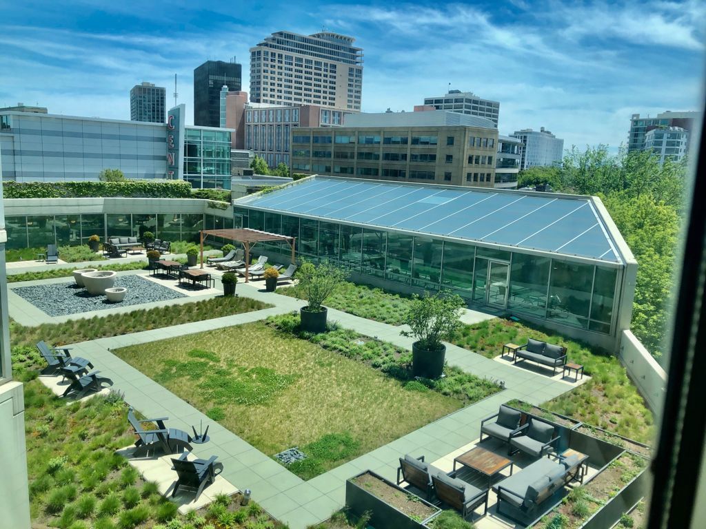 1720 Maple Avenue, Unit 2160 Evanston, IL 60201 - Photo 31 of 45 a view of a garden with lawn chairs and a table
