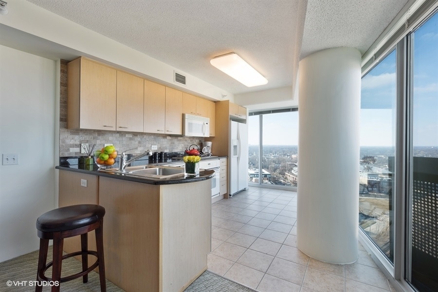 1720 Maple Avenue, Unit 2160 Evanston, IL 60201 - Photo 5 of 45 a kitchen with sink and cabinets