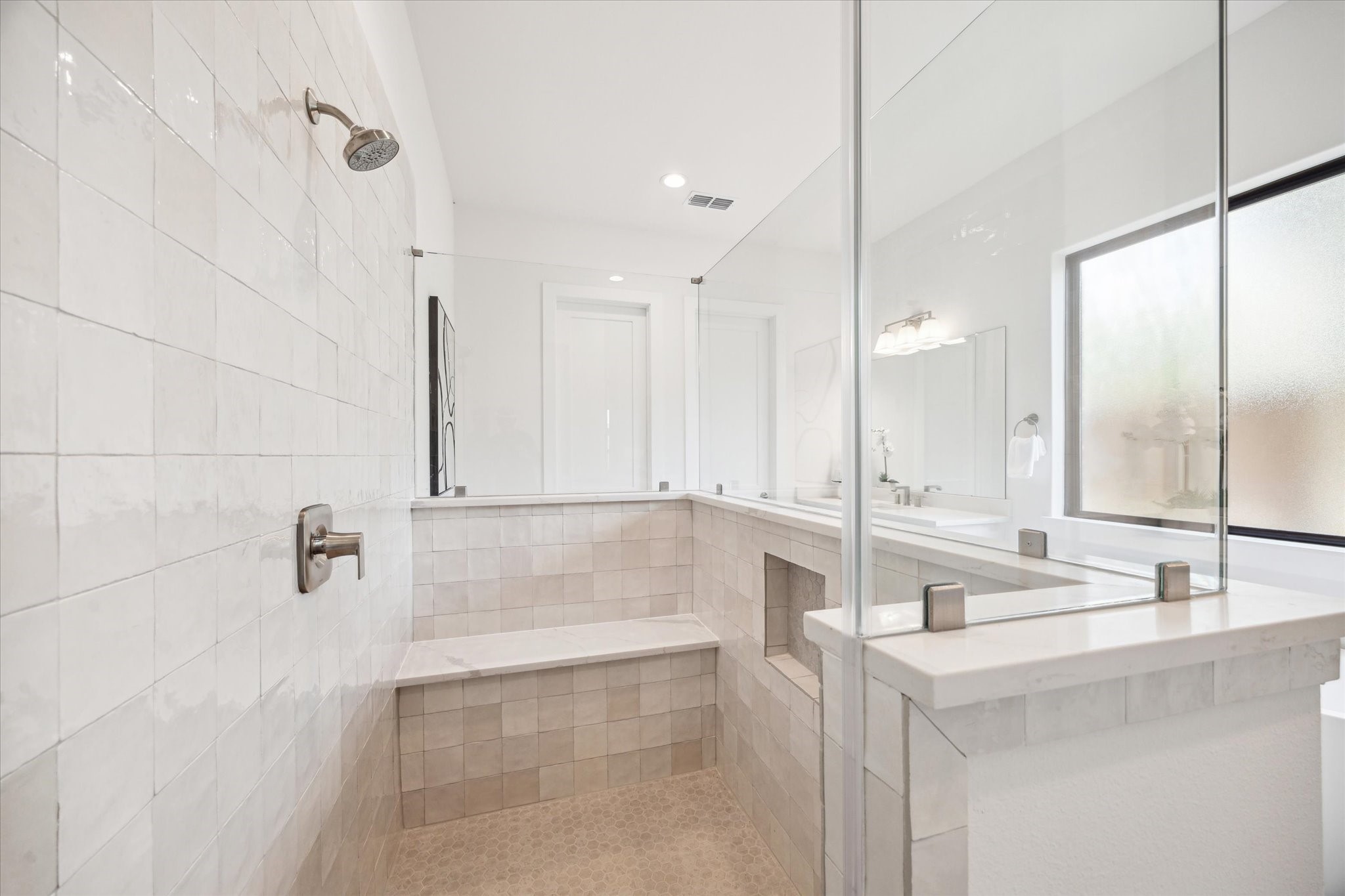 403 Venado View Court Conroe, TX 77304 - Photo 14 of 39 Walk-in shower in the Primary Bath.