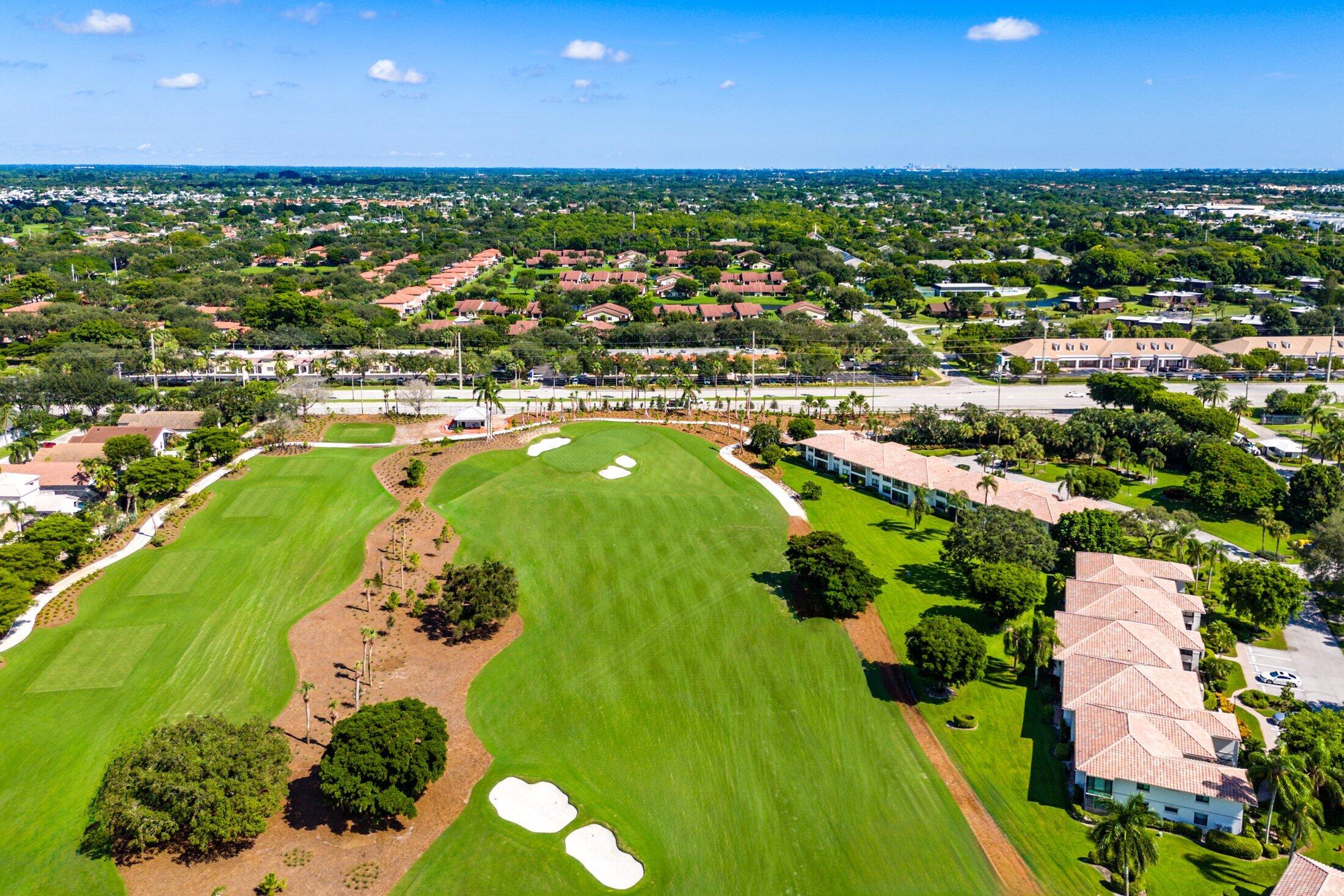 10093 Quail Covey Road, Unit HIBISCUS N Boynton Beach, FL 33436 - Photo 3 of 34 a view of a city
