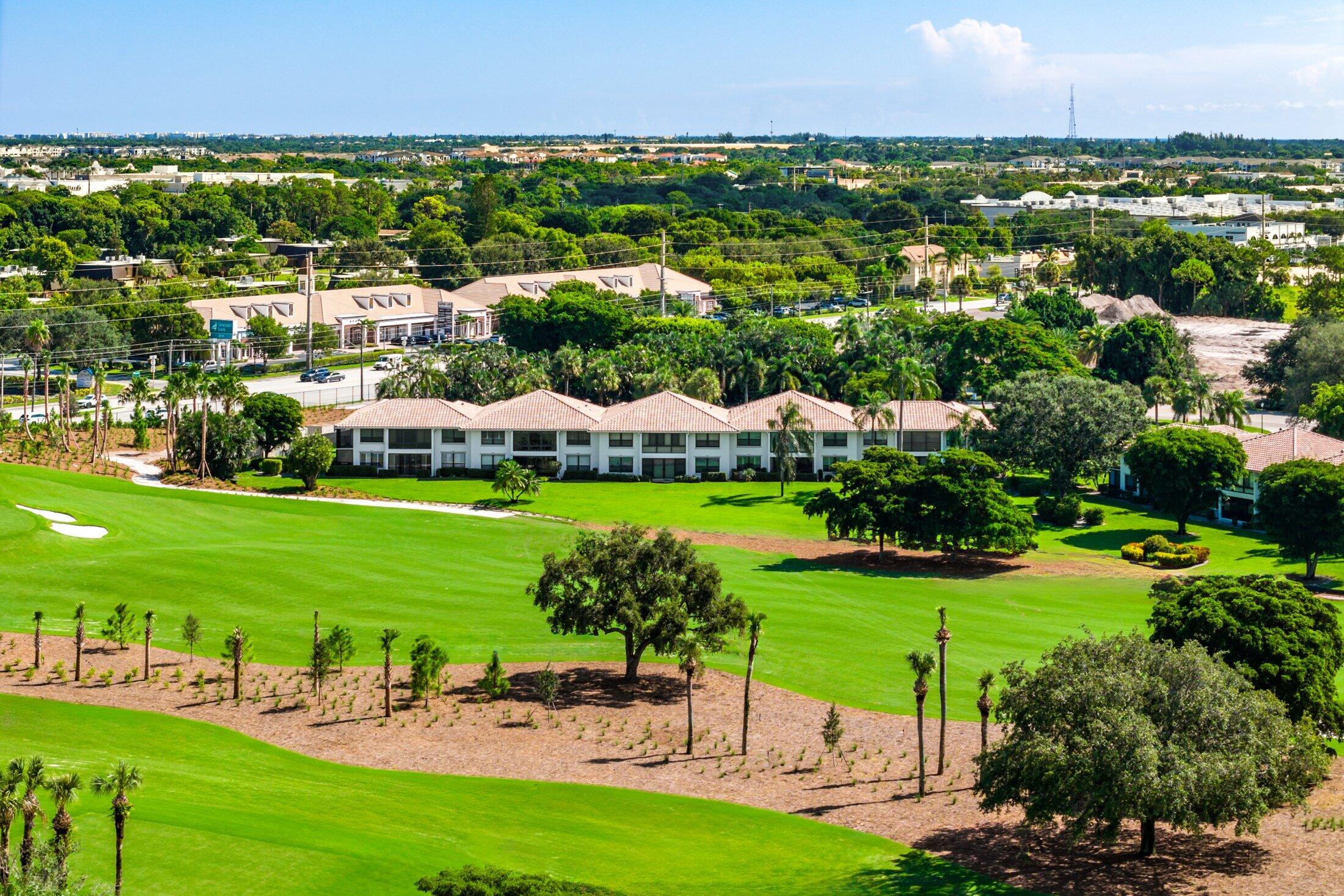 10093 Quail Covey Road, Unit HIBISCUS N Boynton Beach, FL 33436 - Photo 32 of 34 a view of a city